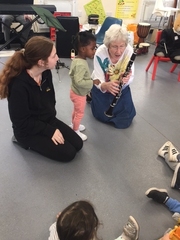 Margaret Archibald invites a prospective clarinet player to press the speaker key