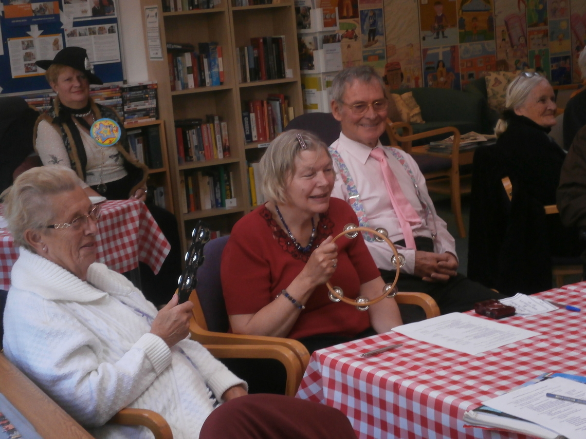Tambourine band accompanies Margaret and Alan at Bradbury