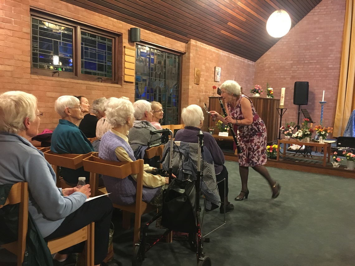 Showing clarinet detail to the audience in Whitgift House Chapel